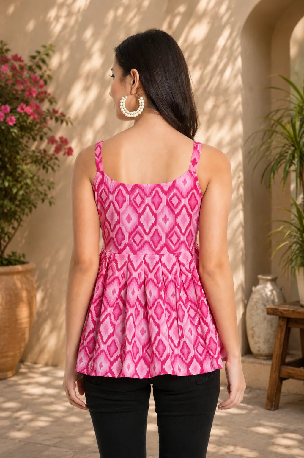 Women's Pink Printed Sleeveless Peplum Top